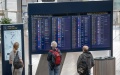Passengers check flight information at Stockholm Arlanda Airport in Stockholm, Sweden. Photo by Xinhua/Wei Xuechao.