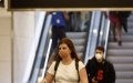Travelers walk through terminals at Ronald Reagan Washington National Airport in Arlington, Virginia, the United States. Photo by Ting Shen/Xinhua.