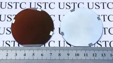 Photo shows two different states of a new type of coating material. Photo by Xinhua.