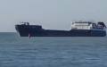 Official Looting. Russian Cargo Ship Enters Mariupol Seaport