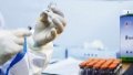 A medical worker prepares a dose of COVID-19 vaccine at a vaccination site in Beijing, capital of China.Photo by Xinhua/Zhang Yuwei.