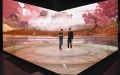 Lu Qi (R) talks to a staff member at a virtual studio of Dawa Tech in Chongqing, southwest China. Photo by Xinhua/Wang Quanchao.