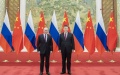 Chinese President Xi Jinping & his Russian counterpart Putin. Photo by Xinhua.