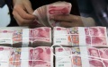 The Chinese currency renminbi (RMB). Photo by Xinhua.