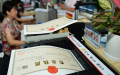 China tightens regulation on business activities of officials’ relatives. Photo by Xinhua.