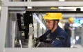 A worker works at the production workshop of the digital factory of Xio Lift in Linping district, Hangzhou, east China's Zhejiang Province. Photo by Xinhua/Huang Zongzhi.