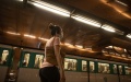 A woman wearing a face mask to protect against COVID-19 waits at a subway station in Paris, France. Photo by Aurelien Morissard/Xinhua.