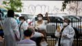 Health care workers assist people waiting to be vaccinated at a monkeypox vaccination site in New York, the United States. Photo by Michael Nagle/Xinhua.