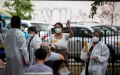 Health care workers assist people waiting to be vaccinated at a monkeypox vaccination site in New York, the United States. Photo by Michael Nagle/Xinhua.