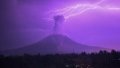 Lightning striking near Mount Sinabung with white smoke being spewed in Karo, North Sumatra, Indonesia. Photo by Sarianto Sembiring/Xinhua.
