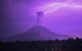Lightning striking near Mount Sinabung with white smoke being spewed in Karo, North Sumatra, Indonesia. Photo by Sarianto Sembiring/Xinhua.