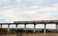 A passenger train runs on the Tsavo River Super Major Bridge near the Tsavo National Park in Kenya. Photo by Xinhua/Dong Jianghui.