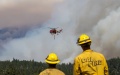 A helicopter flies to battle against a wildfire dubbed Dixie Fire in Lassen National Forest, Northern California, the United States. Photo by Dong Xudong/Xinhua.
