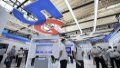 People visit the exhibition booth of China Telecom at the 2022 World 5G Convention in Harbin, capital of northeast China's Heilongjiang Province. Photo by Xinhua/Zhang Tao.