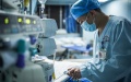 Nurse Qiu Jian works at a ward of the Affiliated Hospital of Guizhou Medical University in Guiyang, southwest China's Guizhou Province. Photo by Xinhua/Tao Liang.
