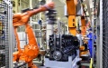 Robotic arms assemble engines at a workshop of the Weichai Power Co., Ltd. in Weifang City, east China's Shandong Province. Photo by Xinhua/Guo Xulei.