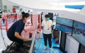 A woman tries skiing simulator at the sports services exhibition during the 2022 China International Fair for Trade in Services (CIFTIS) in Beijing. Photo by Xinhua/Zhang Chenlin.