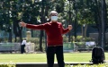 A man wearing a face mask works out at Victoria Park in Hong Kong, south China. Photo by Xinhua/Lo Ping Fai.