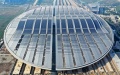 A distributed photovoltaic (PV) power station on the rooftop of the Xiong'an Railway Station in Xiong'an New Area, north China's Hebei Province. Photo by Xinhua/Zhu Xudong.