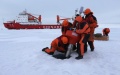 Members of China's research team setting up an ocean profiling float at a short-term data acquisition location near the icebreaker Xuelong, or "Snow Dragon", in the Arctic Ocean. Photo by Xinhua/Wu Yue.