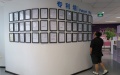 A man looks at the patent granted at Royole in a software town in Shenzhen, south China's Guangdong Province. Photo by Xinhua/Li Mingfang.
