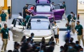 Visitors view cars from Li Auto at the Chengdu Motor Show. Photo by Xinhua/Shen Bohan.