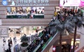 Customers visit a shopping mall in the Tianhe Road shopping area of Guangzhou, south China's Guangdong Province. Photo by Xinhua/Huang Guobao.
