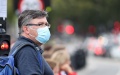 A man wearing a mask is seen near the Westminster Bridge in London, Britain. Photo by Xinhua/Li Ying.