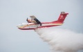 An AG600M firefighting aircraft drops water during a gathering and dropping water test in Jingmen, central China's Hubei Province. Photo by Xinhua/Wu Zhizun.