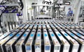 A worker operates on a production line at a lithium battery factory in Tangshan, north China's Hebei Province. Photo by Xinhua/Yang Shiyao.