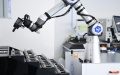 The AI-Chemist system performs a chemical experiment at a laboratory in the University of Science and Technology of China in Hefei, east China's Anhui Province. Photo by Xinhua/Zhang Duan.