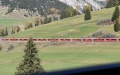 The world's longest narrow gauge passenger train runs on the Rhaetian Railway in Switzerland. Photo by Xinhua/Lian Yi.