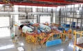 Staff members work at Airbus' Tianjin final assembly line for the A320-family of jets in north China's Tianjin. Photo by Airbus China/Xinhua.