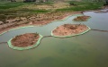 A water system under construction in Linze County, Zhangye City, northwest China's Gansu Province. Photo by Xinhua/Fan Peishen.