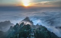 Mount Wudang shrouded in clouds at sunrise in central China's Hubei Province. Photo by Xinhua/Li Wei.