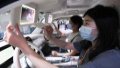 Visitors experience a new energy vehicle at the 2022 World Manufacturing Convention in Hefei, east China's Anhui Province. Photo by Xinhua/Zhang Duan.