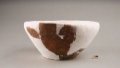 A pottery pot unearthed at a historic ruins site at the lower reaches of the Jialing River in southwest China's Chongqing Municipality. Photo by Xinhua.