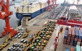 Commercial vehicles before their shipment onto a ro-ro cargo vessel to depart for Africa at Qingdao Port in Qingdao, east China's Shandong Province. Photo by Xinhua/Li Ziheng.