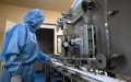 A worker works at a pharmaceutical company in north China's Tianjin. Photo by Xinhua/Zhao Zishuo.