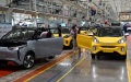 Workers are busy on the production line of new energy vehicles (NEVs) at a factory of Chinese automaker Chery Holding Group Co., Ltd. in Wuhu City, east China's Anhui Province. Photo by Xinhua/Zhou Mu.