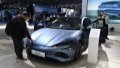 Visitors view a new-energy vehicle displayed at the 2022 World Manufacturing Convention in Hefei, east China's Anhui Province. Photo by Xinhua/Zhou Mu.