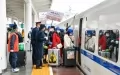 Migrant workers get on a special train at Zunyi Station in Zunyi, southwest China's Guizhou Province. Photo by Xinhua/Yang Wenbin.