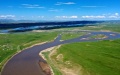 The view of a restored grassland by the Yellow River in Maqu County, Gannan Tibetan Autonomous Prefecture of northwest China's Gansu Province.  Photo by Xinhua/Chen Bin.