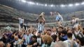 Lionel Messi (top, 2nd L) of Argentina celebrates with the World Cup Trophy after the awarding ceremony of the 2022 FIFA World Cup at Lusail Stadium in Lusail, Qatar. Photo by Xinhua/Cao Can.