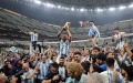 Lionel Messi (top, 2nd L) of Argentina celebrates with the World Cup Trophy after the awarding ceremony of the 2022 FIFA World Cup at Lusail Stadium in Lusail, Qatar. Photo by Xinhua/Cao Can.