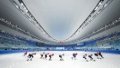 Kids practice short track speed skating at the National Speed Skating Oval in Beijing, China. Photo by Xinhua/Ju Huanzong.