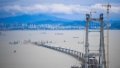 The construction site of the Lingdingyang Bridge, one of the key projects of the Shenzhen-Zhongshan highway link, in south China's Guangdong Province. Photo by Xinhua/Deng Hua.
