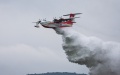 An AG600M aircraft demonstrates its water-dropping function at the 14th China International Aviation and Aerospace Exhibition in Zhuhai, south China's Guangdong Province. Photo by Xinhua/Liu Dawei.