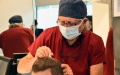 A Turkish doctor conducts hair implantation for a patient in Bursa, Türkiye. Photo by Mustafa Kaya/Xinhua.