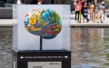 A brain sculpture is seen at the Brain Project art exhibition in Nathan Phillips Square Pond in Toronto, Canada. Photo by Zou Zheng/Xinhua.